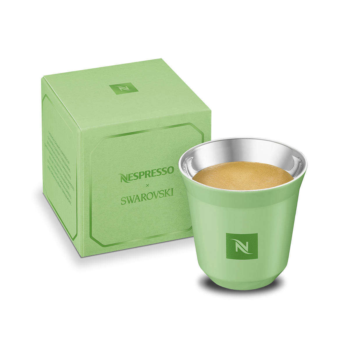 Green Nespresso Swarovski long cup with its box, front view