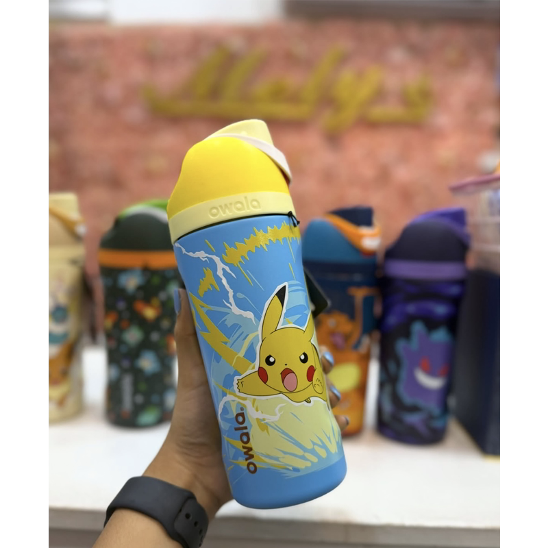 Hand holding Owala Pokémon water bottle, front view