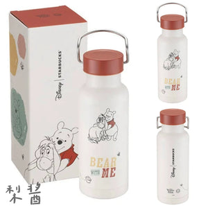 Winnie the Pooh white handheld water bottle with character illustration and packaging