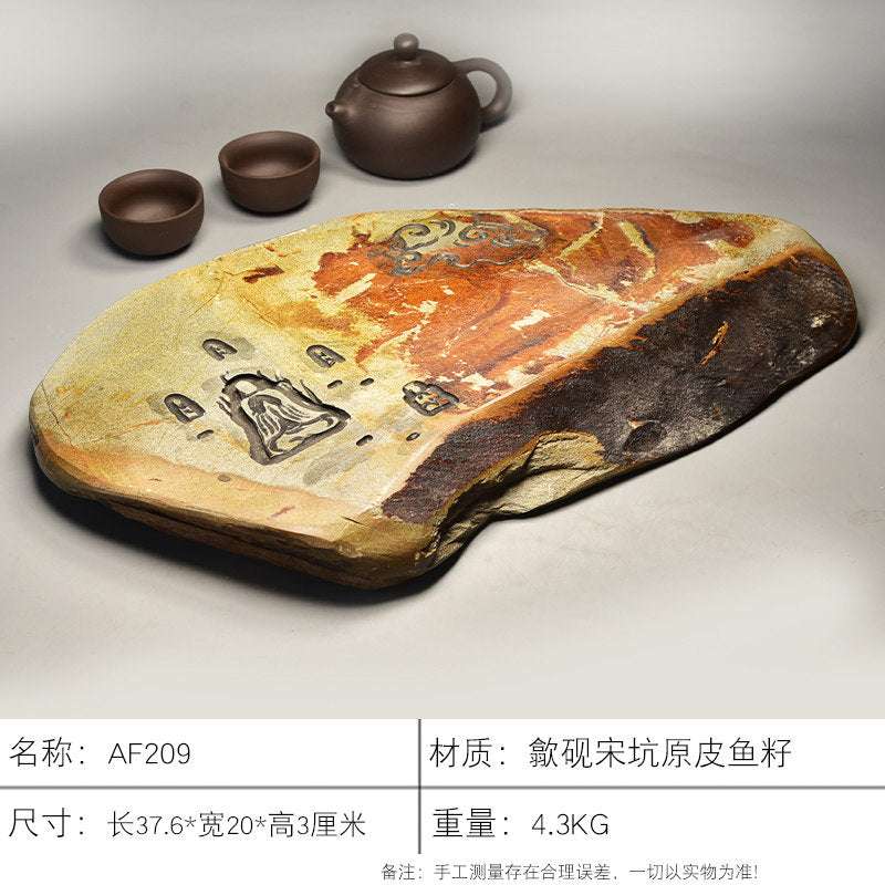 Handcrafted natural stone tea tray with carved traditional motifs for Gongfu tea ceremony