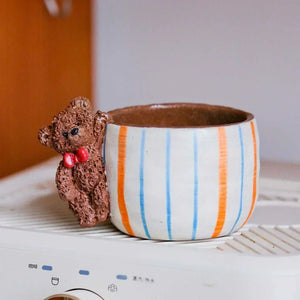 Hand-sculpted ceramic coffee cup Artisan Series with whimsical 3D animal and dancer designs