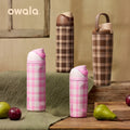 Owala plaid limited edition bottles in Highland Pink and Mocha Brown with fruit