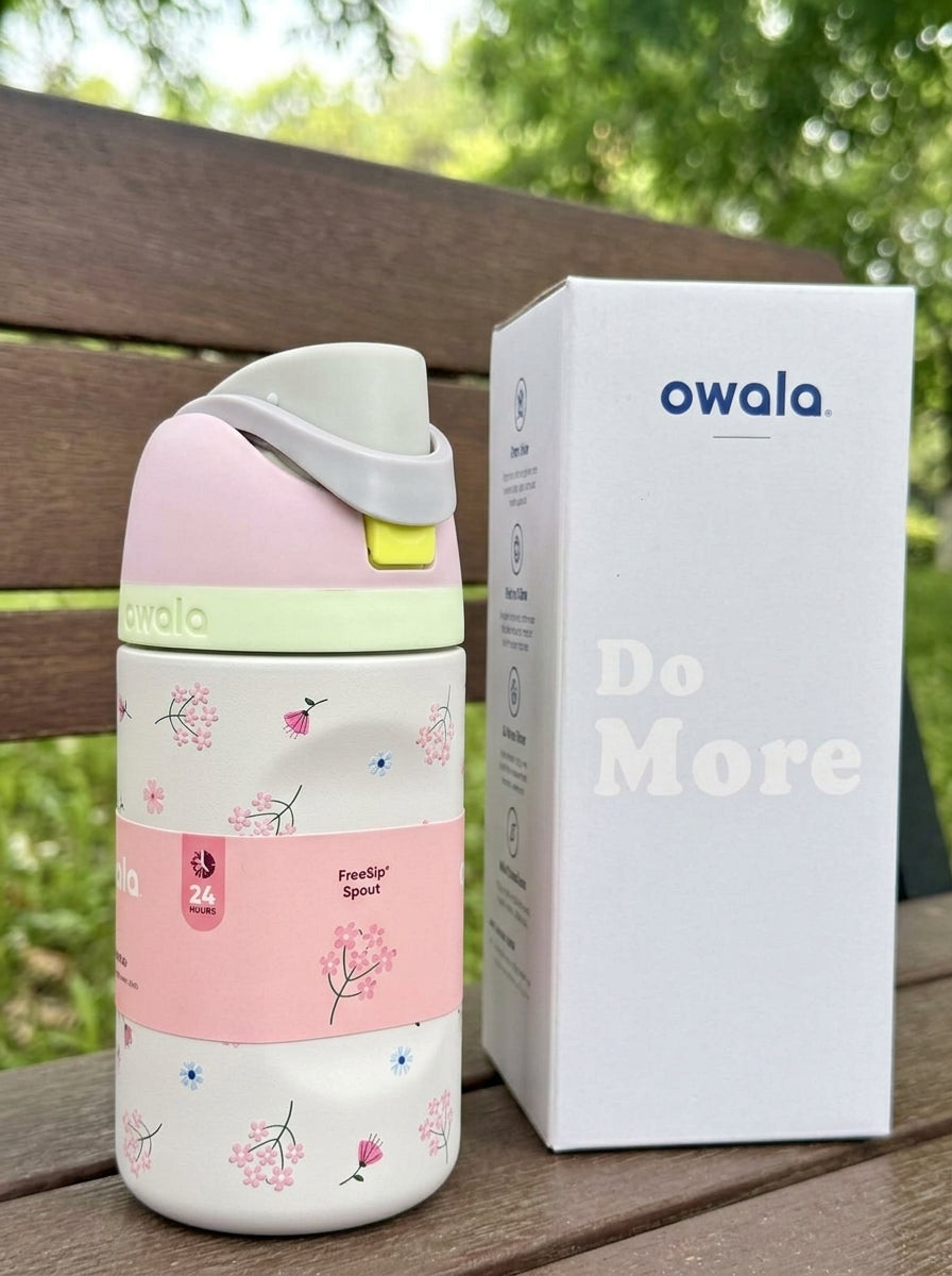 Floral stainless steel water bottle by Owala with a push-button lid