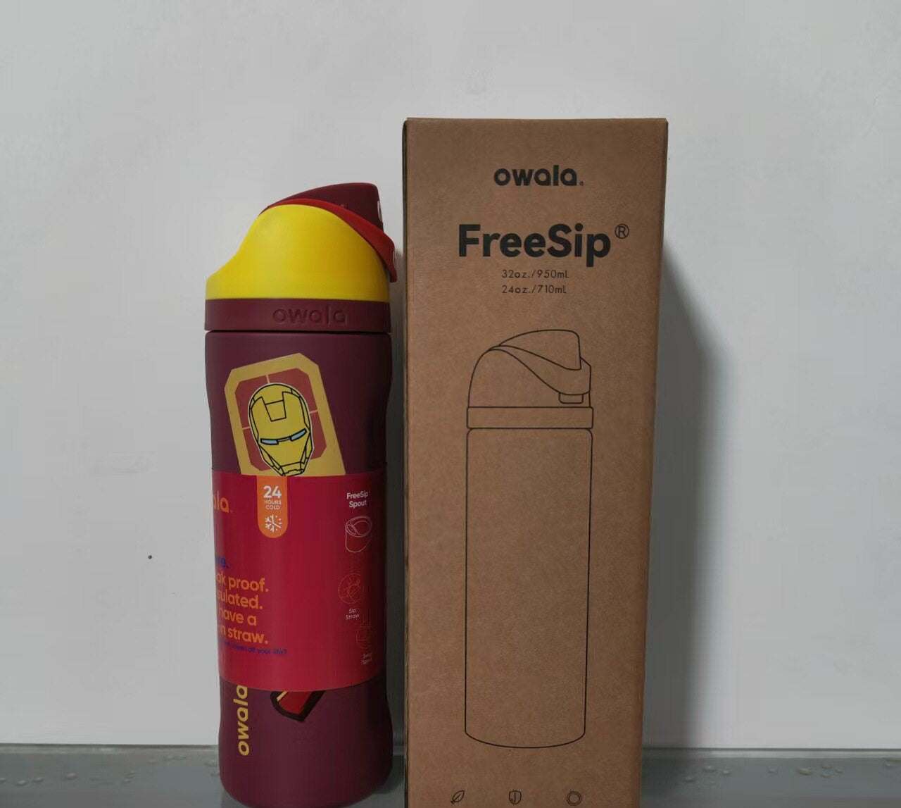 Owala 24oz FreeSip Water Bottle Captain America design with carry loop and protective lid