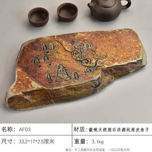 Handcrafted natural stone tea tray with intricate carvings for Gongfu tea ceremony