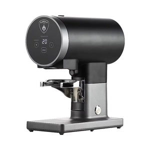 Black Eureka Disko electric coffee tamper, side view on a white background