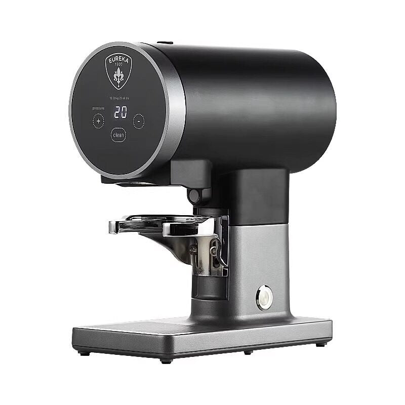 Black Eureka Disko electric coffee tamper, side view on a white background