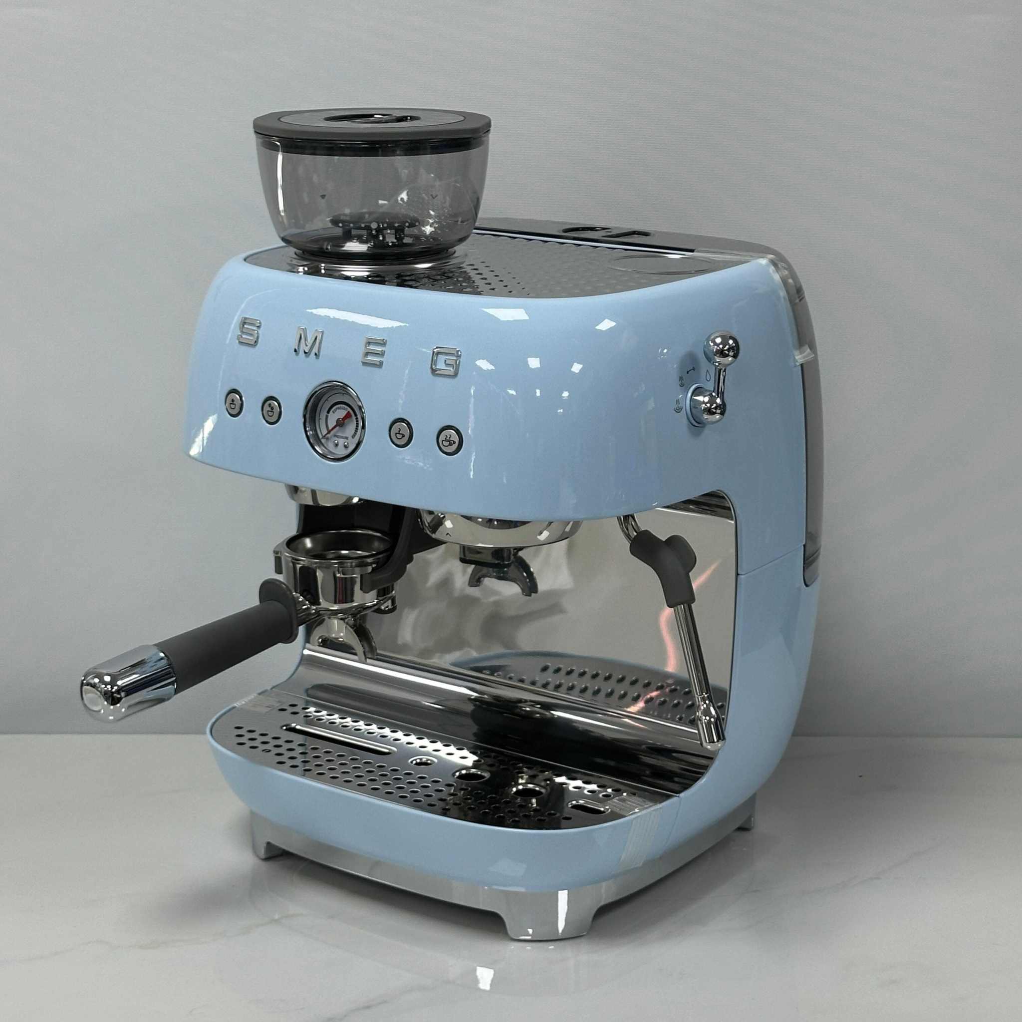 SMEG Espresso Coffee Machine with built-in grinder, 20 bar pressure, milk frother, and premium metal body design