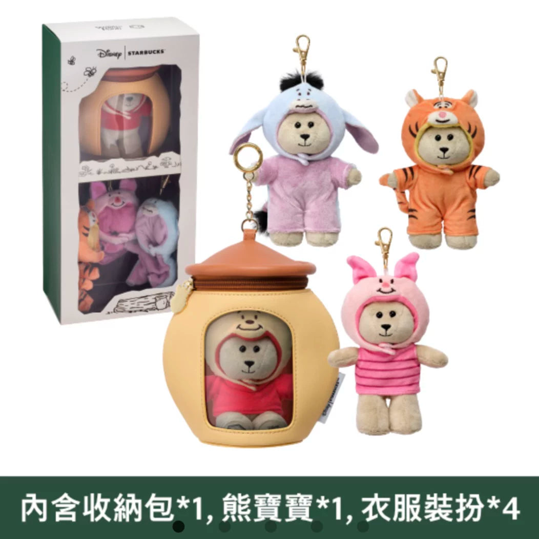 Winnie the Pooh plush toy keychains in costume outfits with storage container