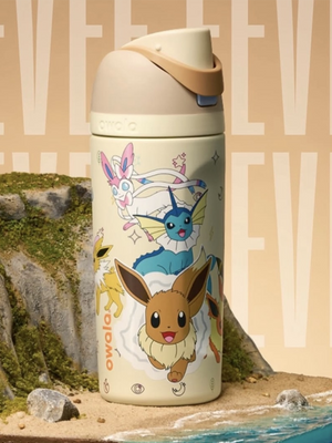 Owala Eevee water bottle in cream with character graphics, front angled view