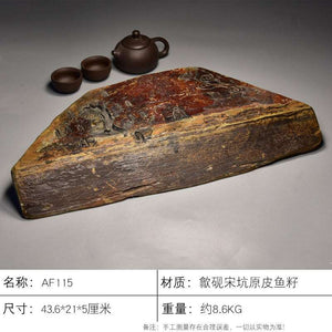 Handcrafted natural stone tea tray with intricate carvings, authentic She Yan raw stone, and rich golden-brown hues for Gongfu tea ceremonies