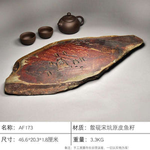Handcrafted natural stone tea tray with intricate She Yan stone texture and traditional carved motifs for Gongfu tea ceremonies