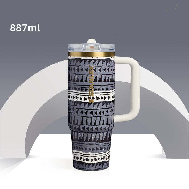 Stanley x NEST limited edition insulated travel bottles with artistic designs and dual-wall vacuum insulation
