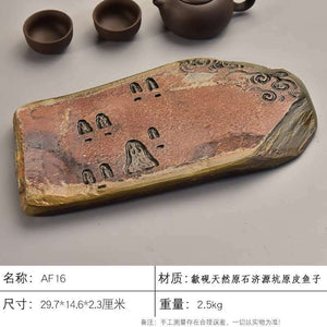 Handcrafted natural stone tea tray with intricate carvings for Gongfu tea ceremony