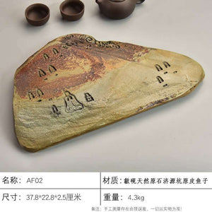 Handcrafted natural stone tea tray with traditional carvings for Gongfu tea ceremonies
