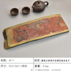 Handcrafted natural stone tea tray with carved traditional motifs for Gongfu tea ceremony