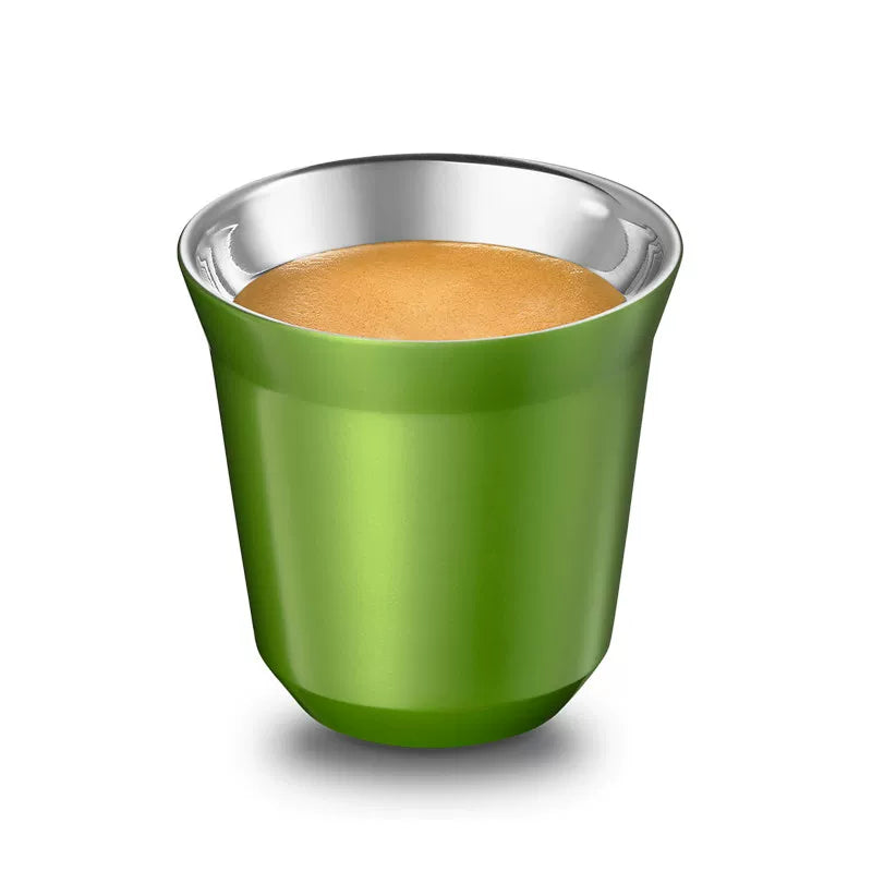 Green Pixie espresso cup with coffee, angled view
