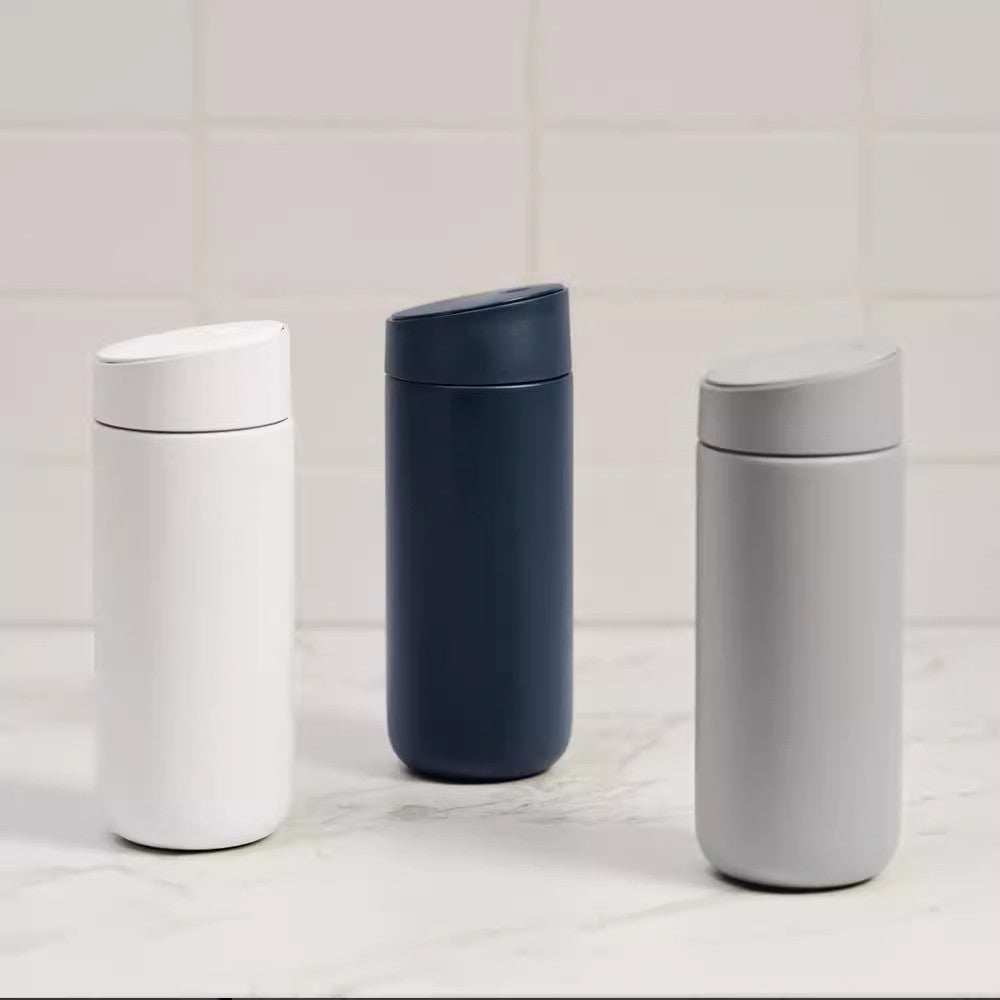 Fellow Carter 3-in-1 insulated tumbler gift set with three lids and splash guard in elegant packaging