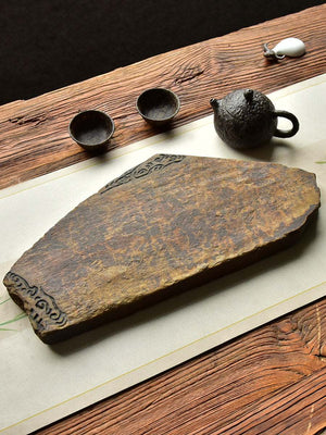 Handcrafted natural stone tea tray with traditional carving and ochre tones for Gongfu tea ceremony
