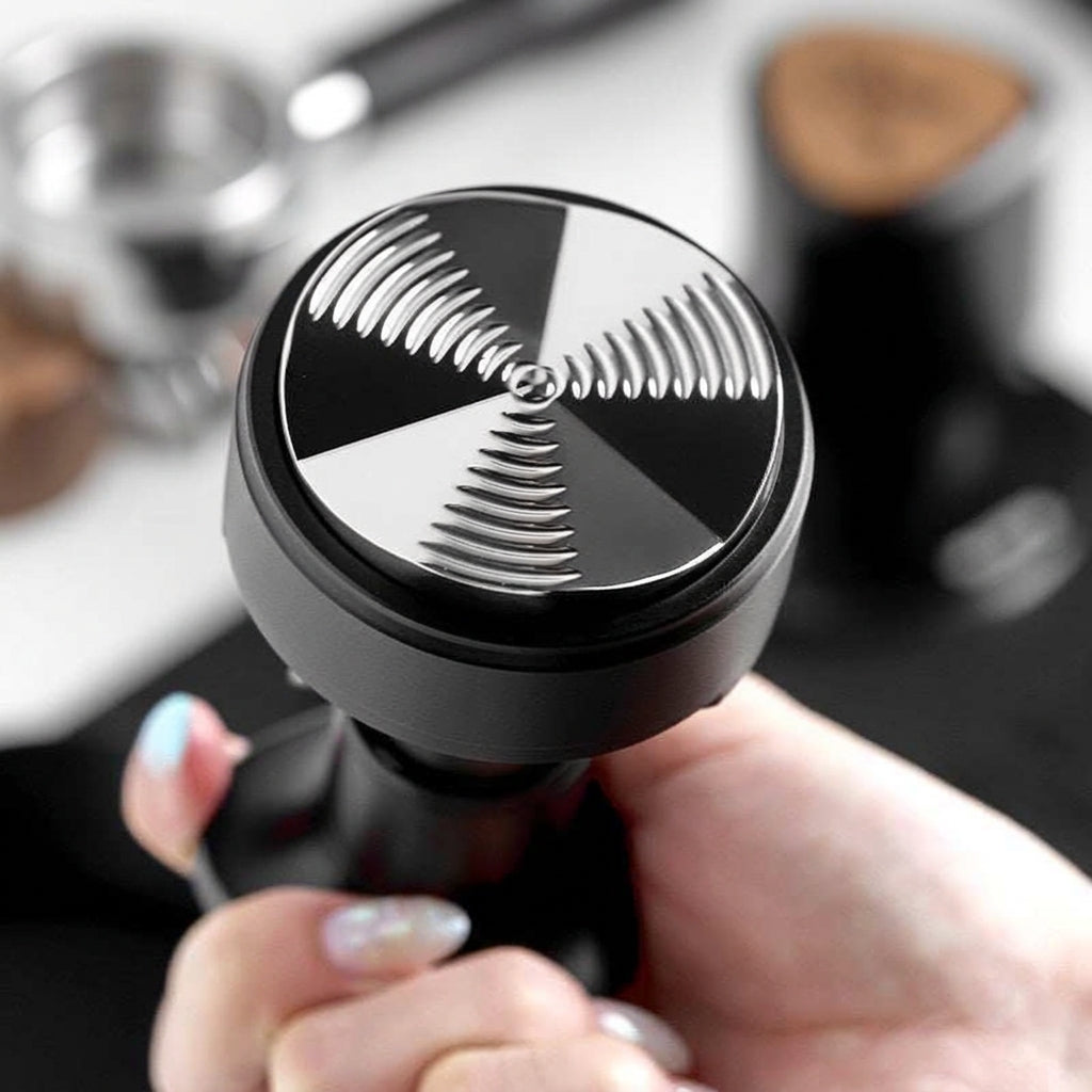 IKAPE rotary espresso leveler for flattening coffee in a portafilter basket