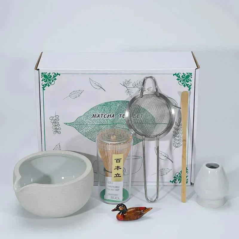 Japanese Maccha tea set with bowl, whisk, strainer, and accessories.