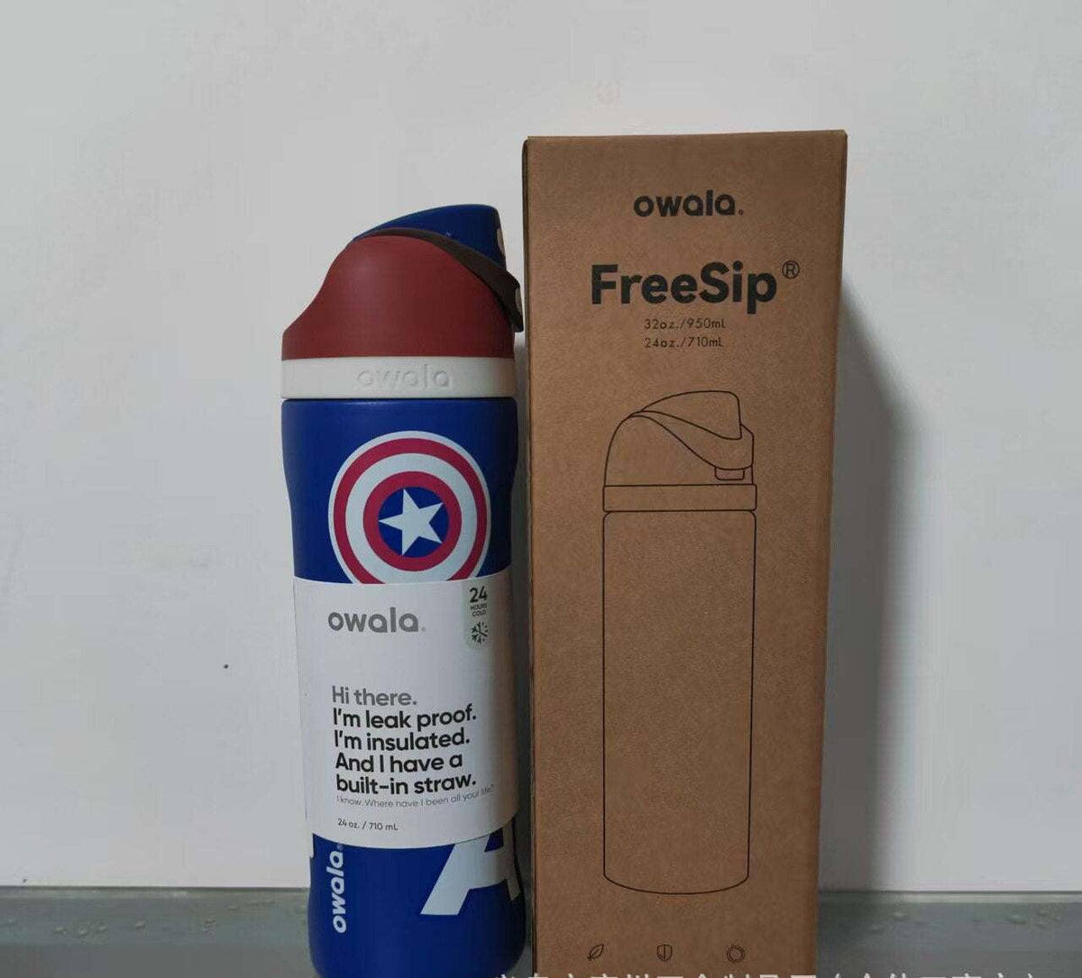 Owala 24oz FreeSip Water Bottle with Marvel superhero designs and protective lid