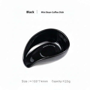 ceramic coffee bean dosing tray with ergonomic pouring spout and mango shape