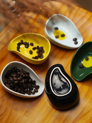 ceramic coffee bean dosing tray with ergonomic spout and weighing dish