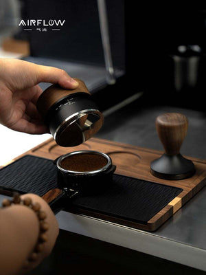 Solid wood espresso tamping station with silicone mat and tool slots