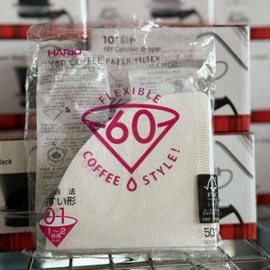 Hario V60 coffee paper filters for pour over dripper in white packaging