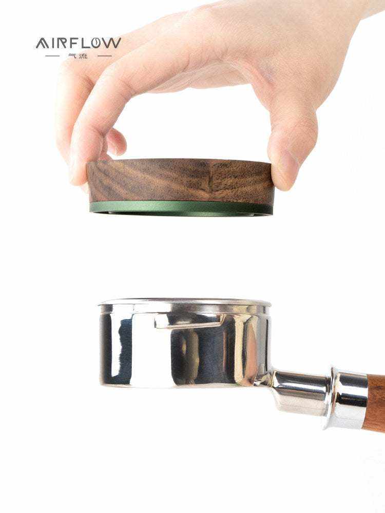 Magnetic espresso dosing funnel with walnut wood on portafilter