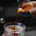 MUVNA glass espresso measuring cup with spout and iridescent finish 100ml