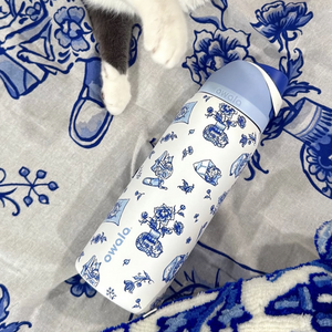 Owala Blue Cat insulated water bottle with straw and blue feline design