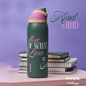 Owala FreeSip Kind Mind Color Drop insulated water bottle in forest green with pink lid