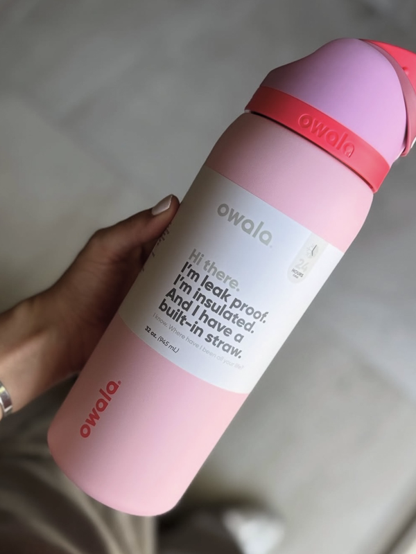 Pink Owala FreeSip insulated water bottle with straw and leak-proof lid
