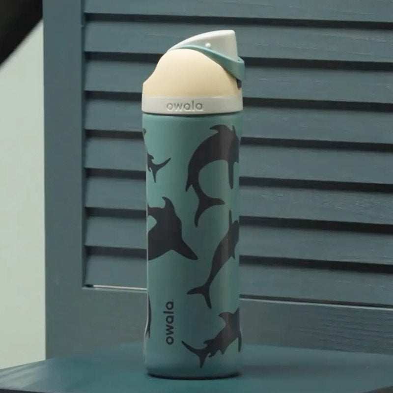Owala FreeSip shark print teal stainless steel water bottle with dual-function lid