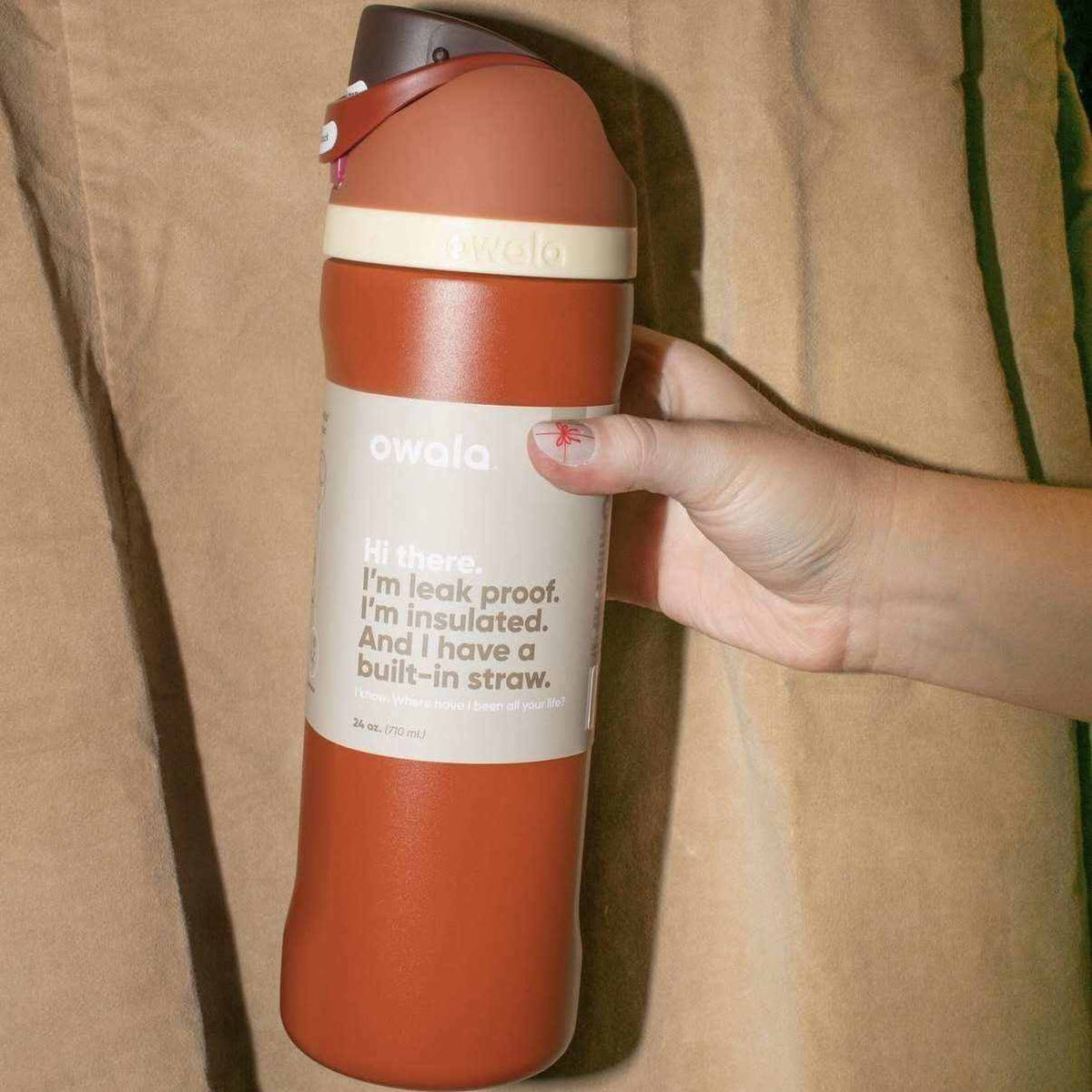 Owala insulated stainless steel water bottle with built-in straw and leak-proof lid