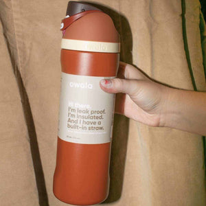 Owala insulated stainless steel water bottle with built-in straw and leak-proof lid