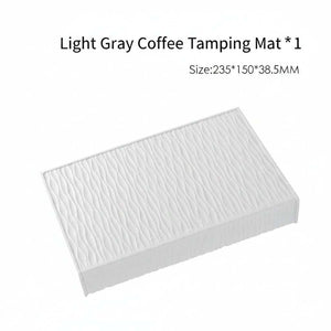 Silicone non-slip corner espresso tamping mat on countertop