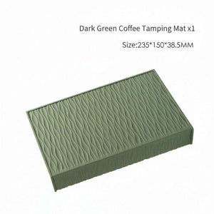 Silicone non-slip corner espresso tamping mat on countertop edge