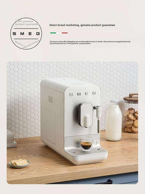 SMEG BCC02 automatic espresso machine with steam wand on countertop