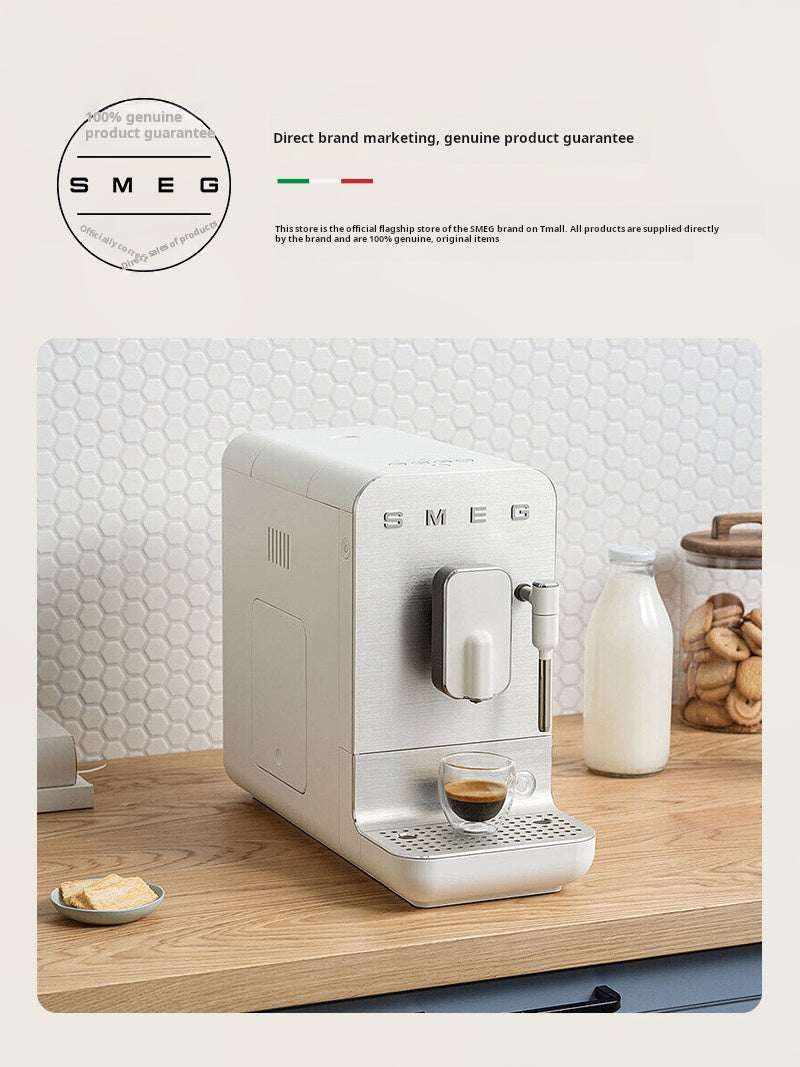 SMEG BCC02 automatic espresso machine with steam wand on countertop