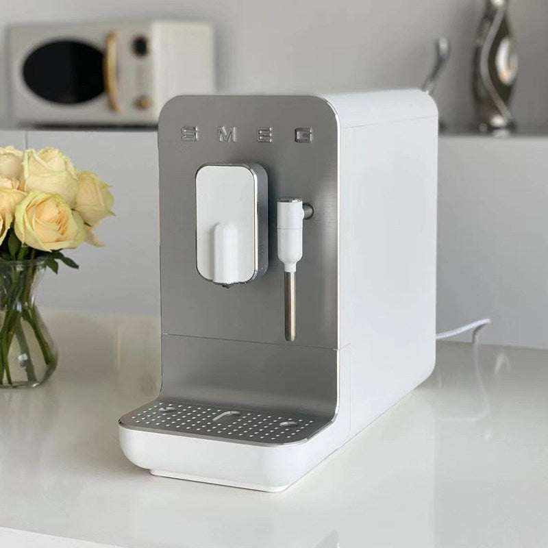 SMEG BCC12 automatic espresso machine with steam milk frother