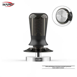iKAPE spring loaded espresso tamper with ripple base and transparent handle on white background