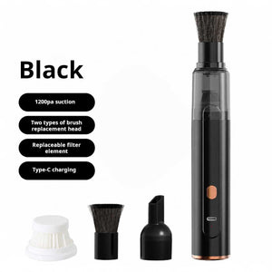 Wireless handheld coffee vacuum cleaner with brush and crevice nozzles on desk