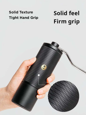 Compact manual coffee grinder with stainless steel burr and ergonomic handle for precise coffee grinding